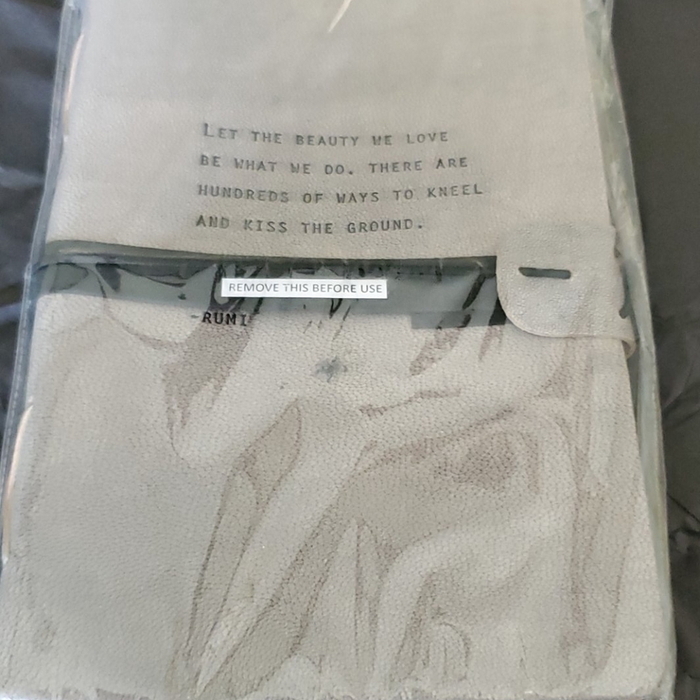 Gorgous leather diary words by rumi free pen